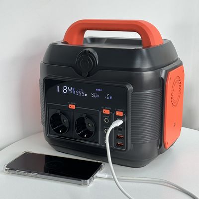 Potenza portatile mobile da 600W 6kg Arancione Nero Potenza di accumulo di energia per emergenze all'aperto all'interno