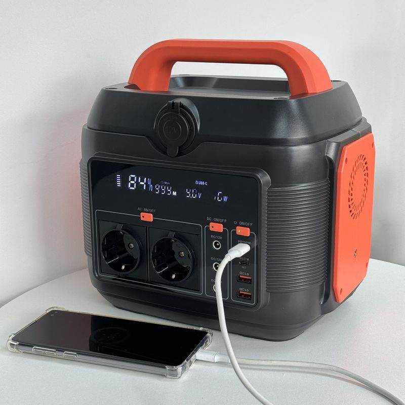 Potenza portatile mobile da 600W 6kg Arancione Nero Potenza di accumulo di energia per emergenze all'aperto all'interno